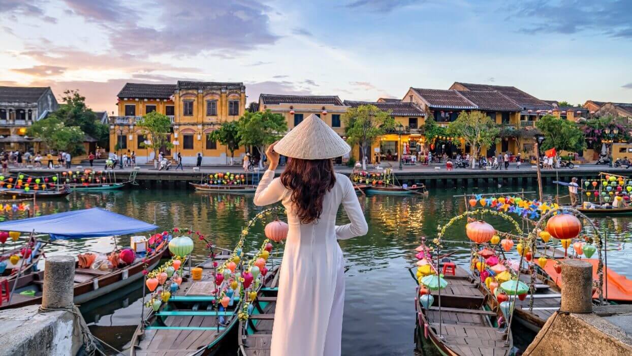 woman standing infront of a river in vietnam